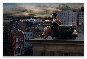 Louisiana Musician atop a roof overlooking the French Quarter.