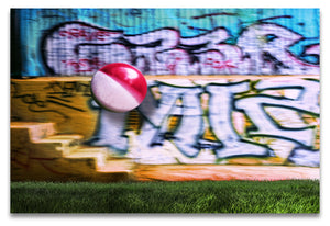 A Colorful Beachball in Mid Air Against a Graffiti Background at Griffith Park-Los Angeles.