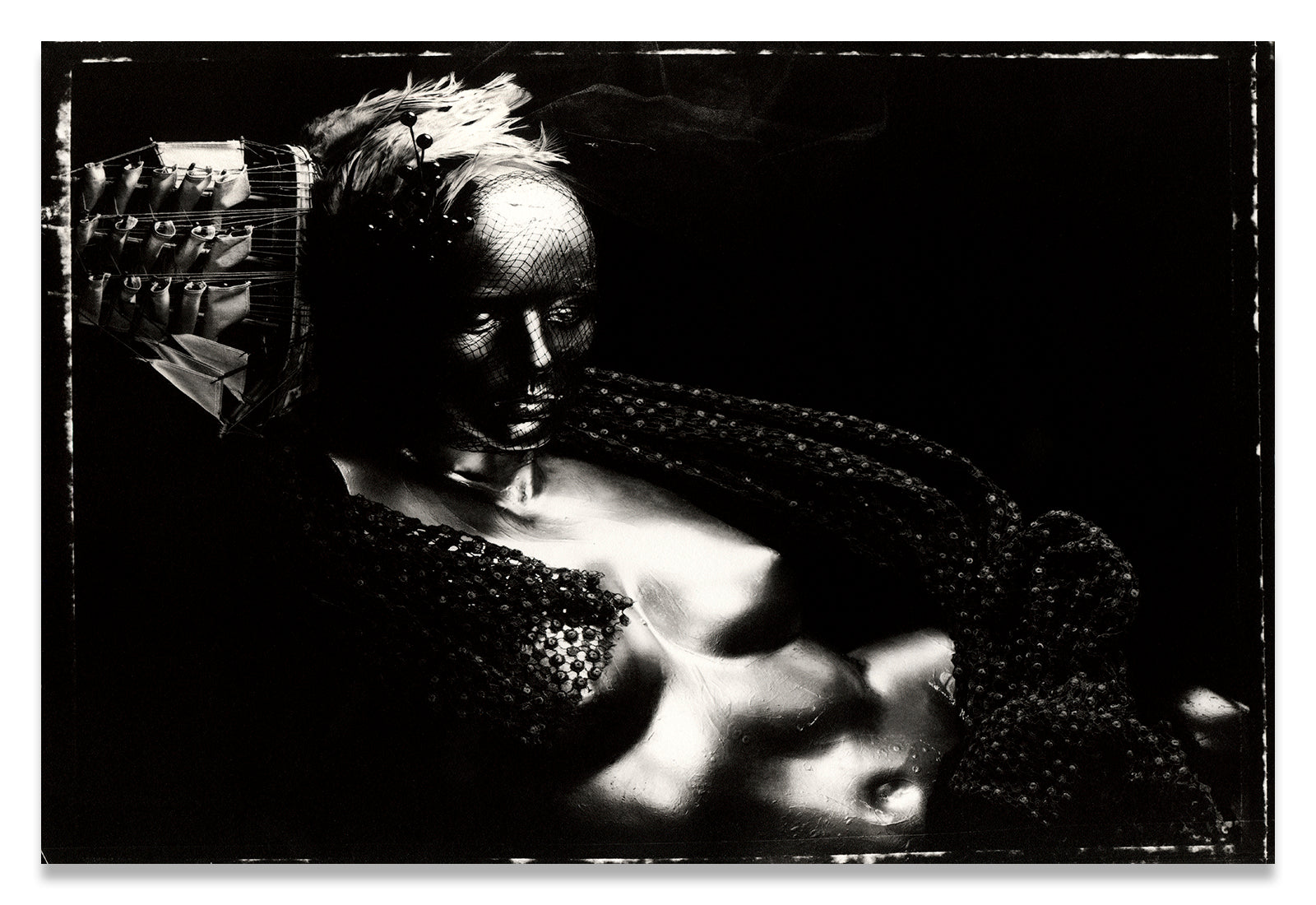 Horizontal Black and White Portrait, on Polaroid 55, of a nude, metallic mannequin torso with a Ship Hat and Feather Headpiece along the side of the Head-Metal Print-Aluminum Print