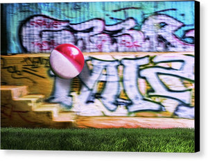 A Colorful Beachball in Mid Air Against a Graffiti Background at Griffith Park-Los Angeles.