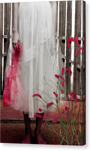 Woman in a Vintage White Lace Dress, cropped at waist, Standing With a Bloody Hand Dripping Down Her Dress in front of a Gate-Canvas Print