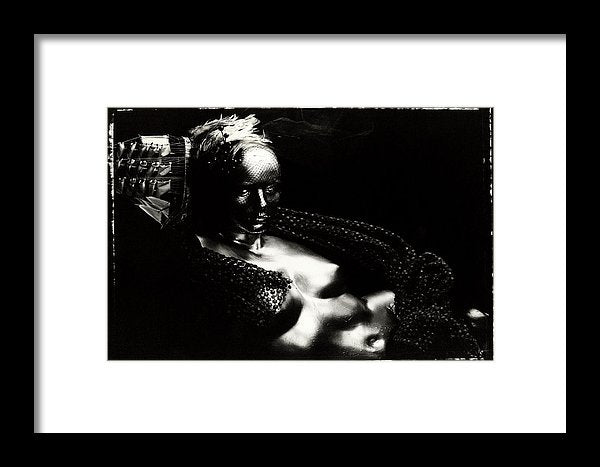 Horizontal Black and White Portrait, on Polaroid 55, of a nude, metallic mannequin torso with a Ship Hat and Feather Headpiece along the side of the Head-Framed Fine Art Print