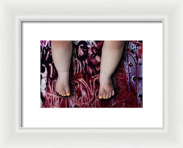 Female Baby Legs and Yellow Painted Toenails on Graffiti Background- Framed Fine Art Print