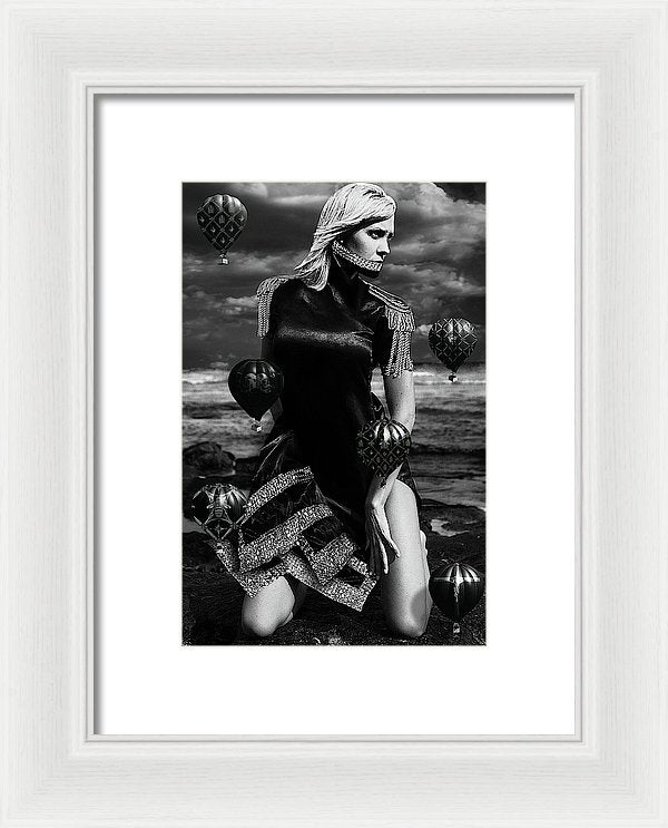 Black & White Portrait on a woman on her knees at the beach with a Neck Corset and small Black Hot Air Balloons- Framed Fine Art Print